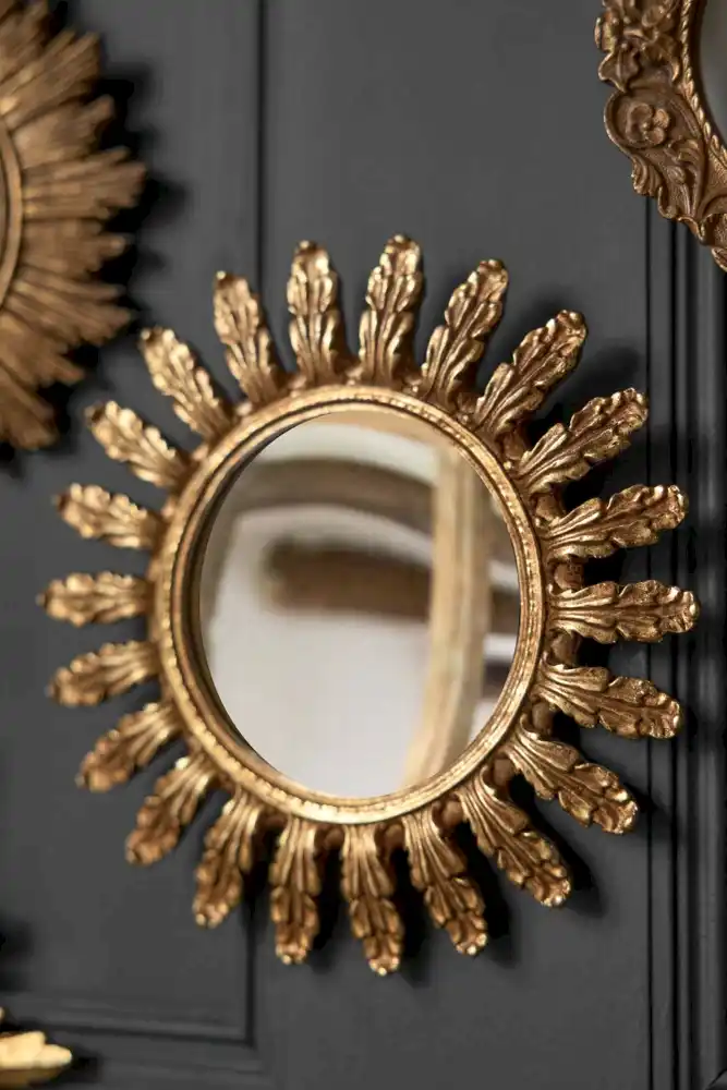Lifestyle image of the Antique Gold Decorative Frame Convex round Mirror