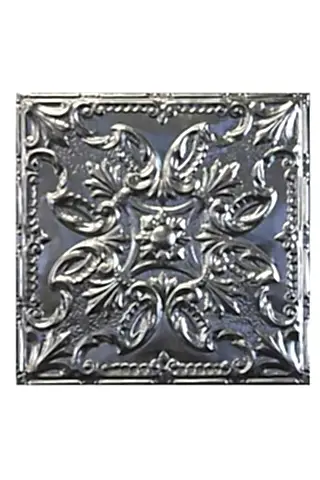 cutout image of floral tin tile on white background