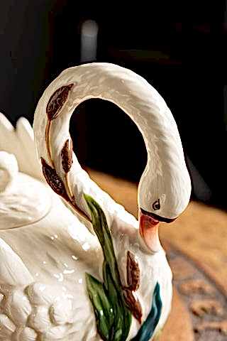 Close-up of the face/handle of the Beautiful Painted Swan Teapot.