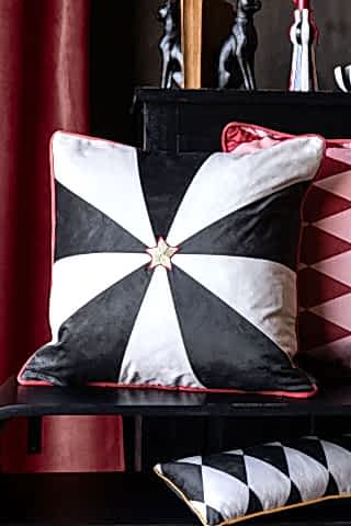 Lifestyle image of the Monochrome Embroidered Star Cushion