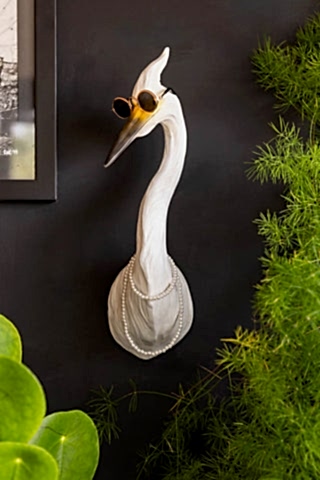 Lifestyle image of the Quirky Bird With Sunglasses & Necklace Wall Art