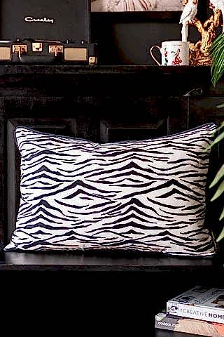 Lifestyle image of the Snow Tiger Print Cushion
