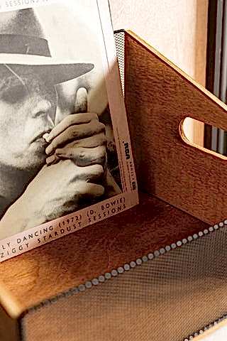 The inside of the Wood & Mesh Record Storage Box, shown with a Bowie record. 