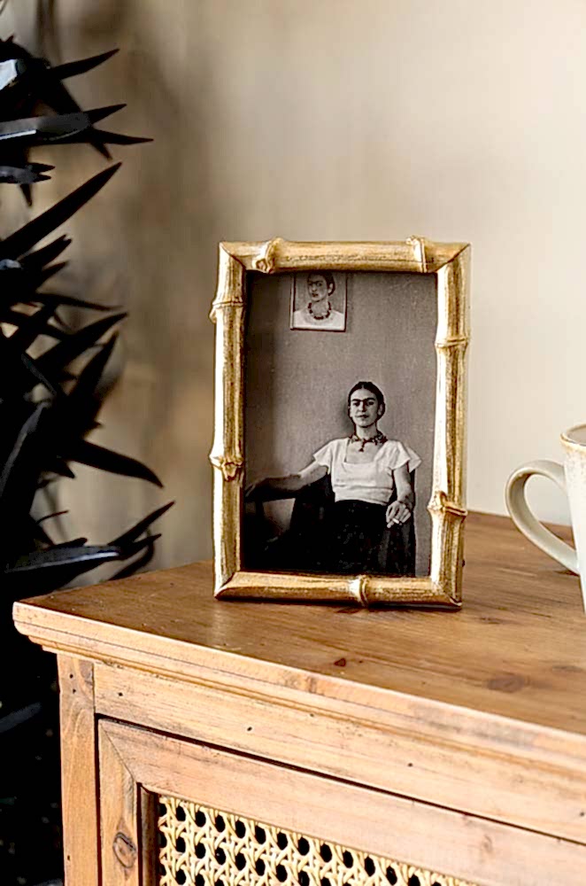 Lifestyle image of the Antique Gold Bamboo Photo Frame 4x6"