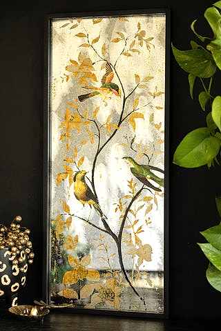 Lifestyle image of the Beautiful Bird Wall Art Mirrored wall art. 