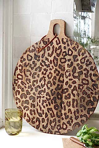 Lifestyle image of the Leopard Print Mango Wood Serving Board - Large